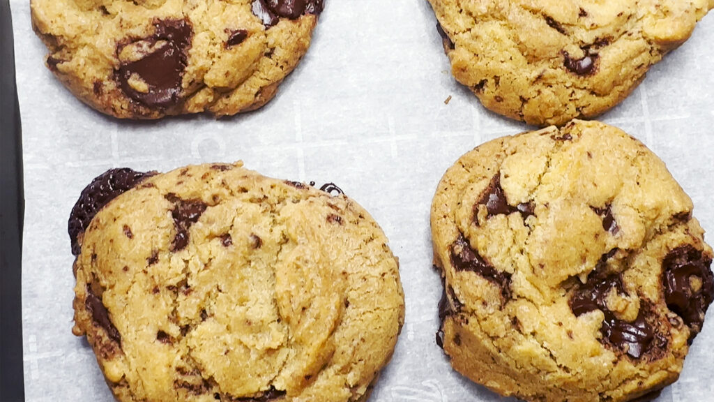 Chocolate chip cookies on baking sheet.