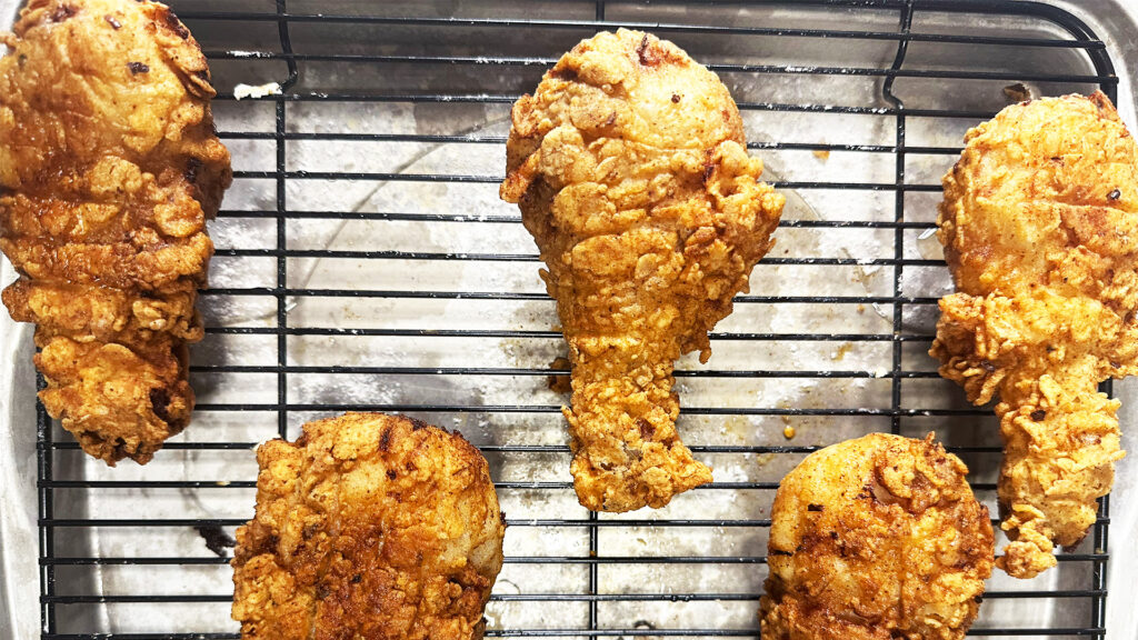 Fried Chicken placed on cooling tray.